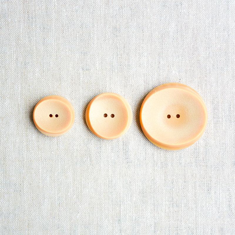 The Button Dept. : Plastic : Honey Oval Eclipse - the workroom