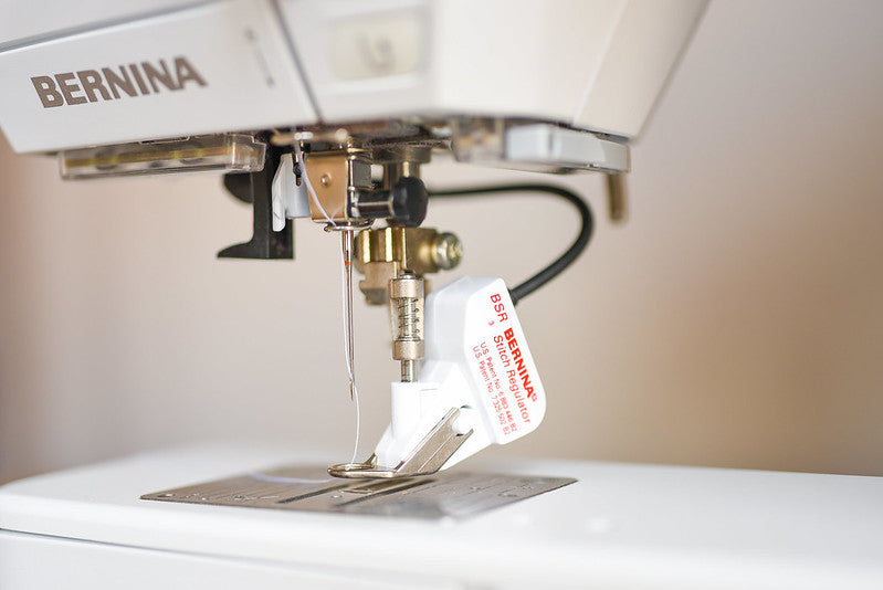 Bernina Stitch Regulator close-up on sewing machine.