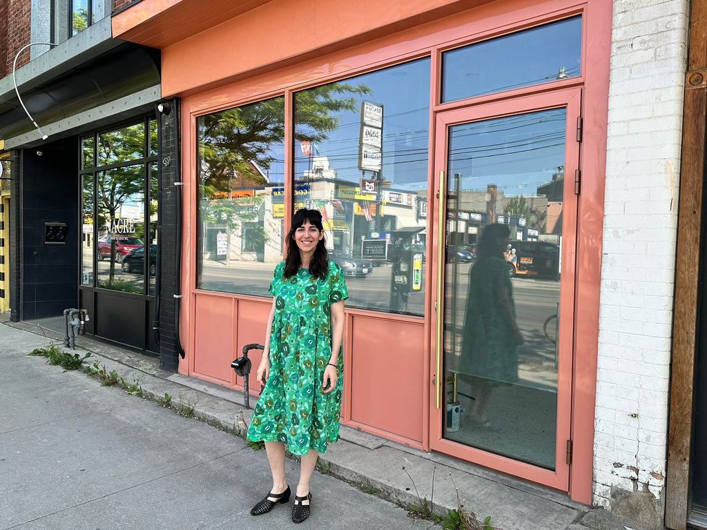 Michelle Galetta, owner of Kiriki Press standing outside the Kiriki Little Design Shop