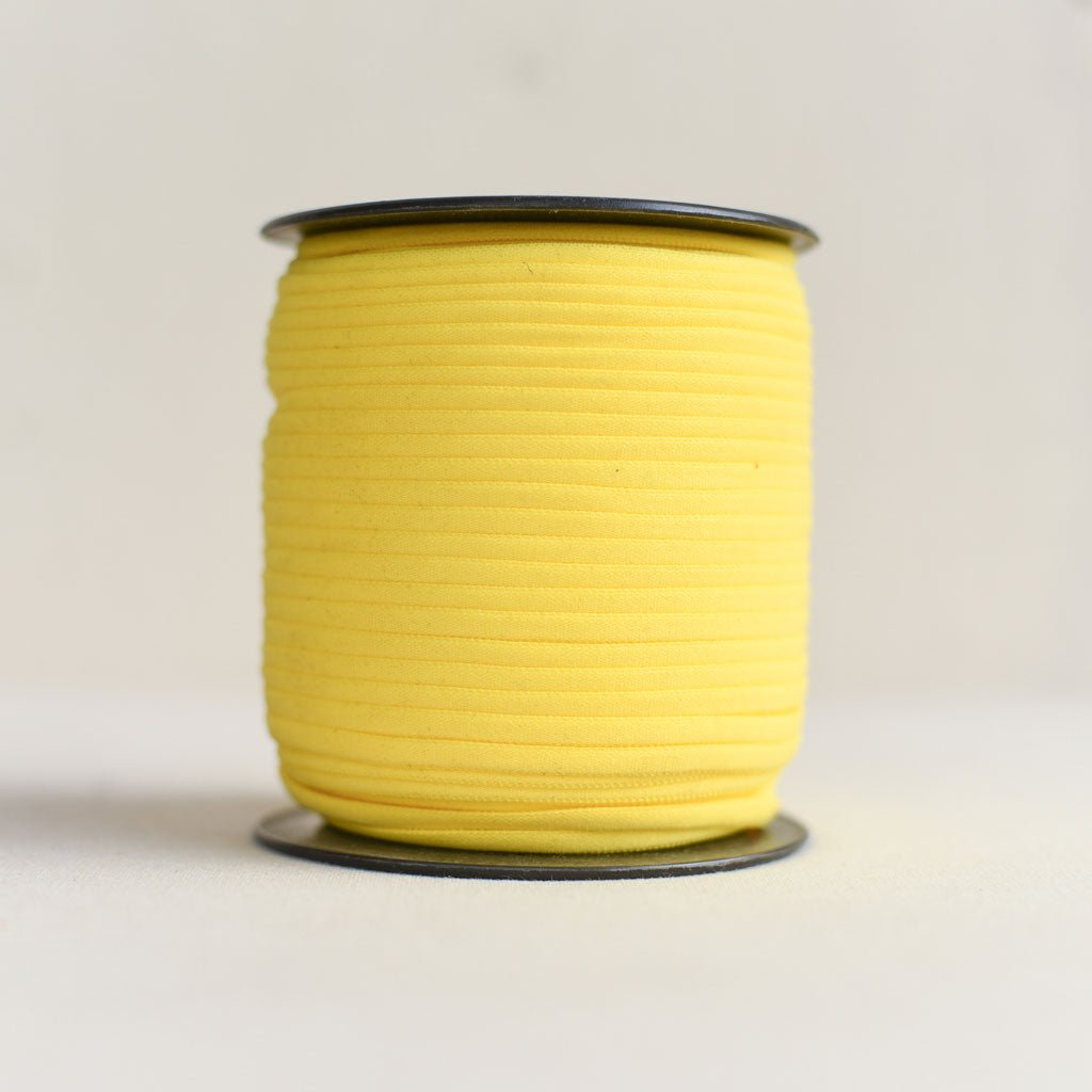 Galaxy Notions : Banded Stretch Elastic : Various Colours : 1/6" wide by the spool - the workroom