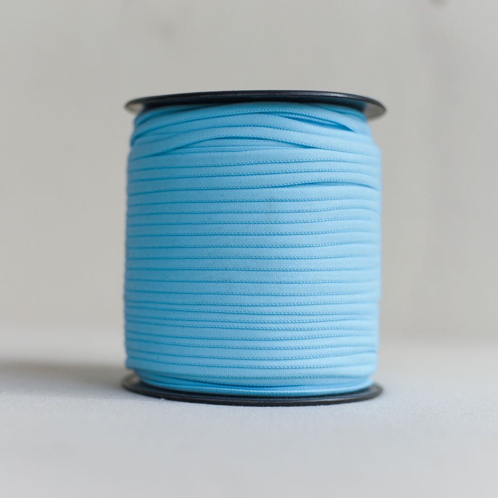 Galaxy Notions : Banded Stretch Elastic : Various Colours : 1/6" wide by the spool - the workroom