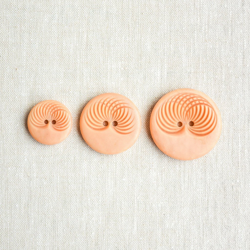 The Button Dept. : Plastic : Apricot Slinky - the workroom