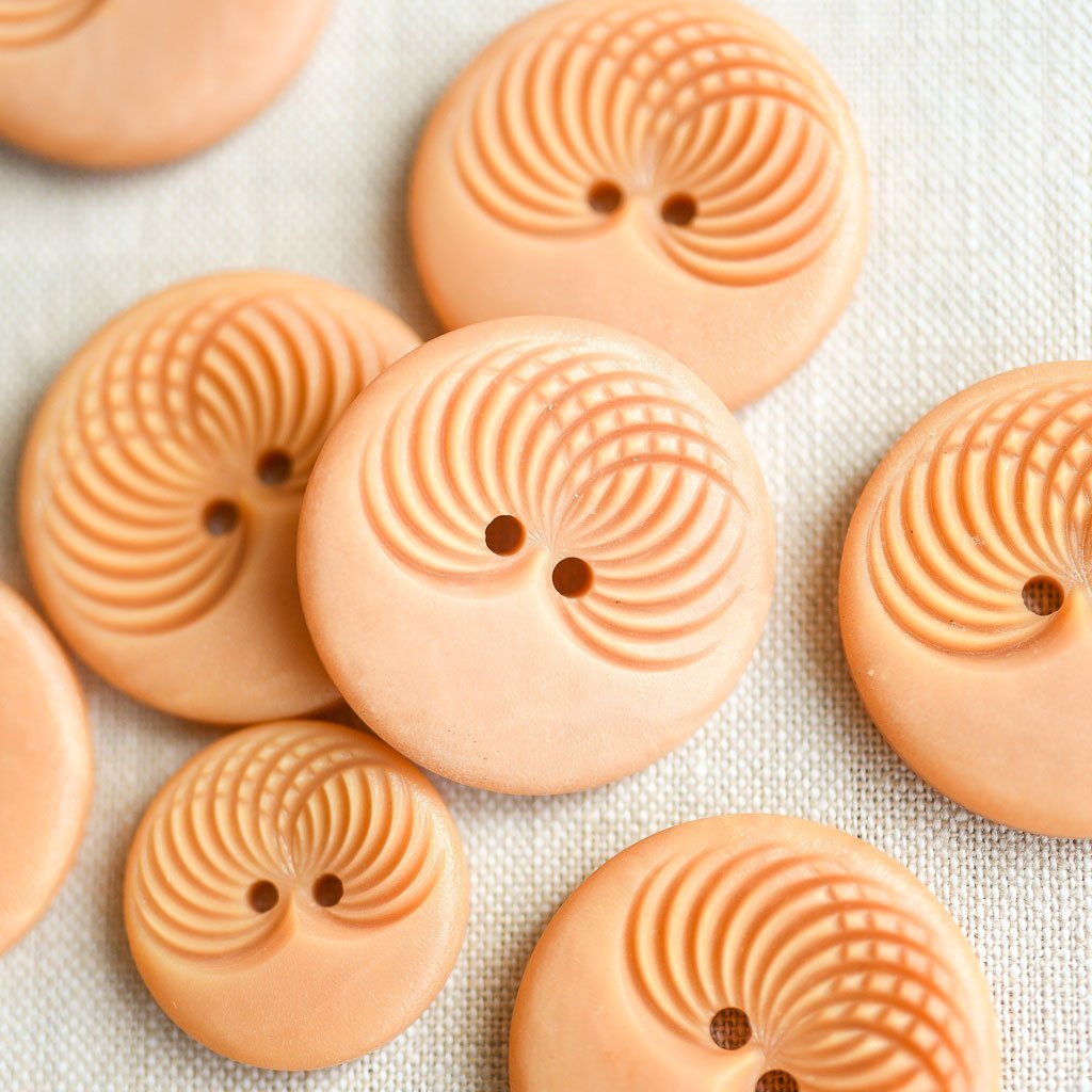 The Button Dept. : Plastic : Apricot Slinky - the workroom