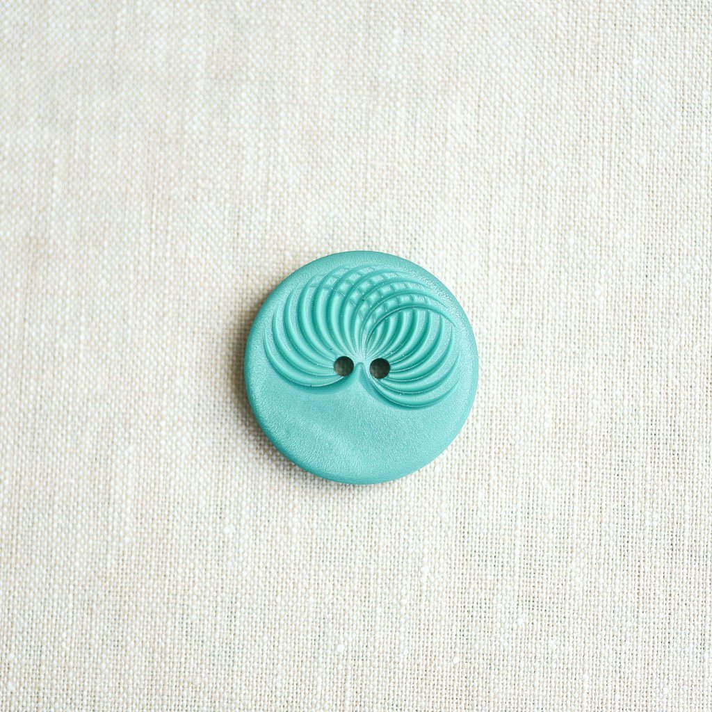 The Button Dept. : Plastic : Turquoise Slinky - the workroom