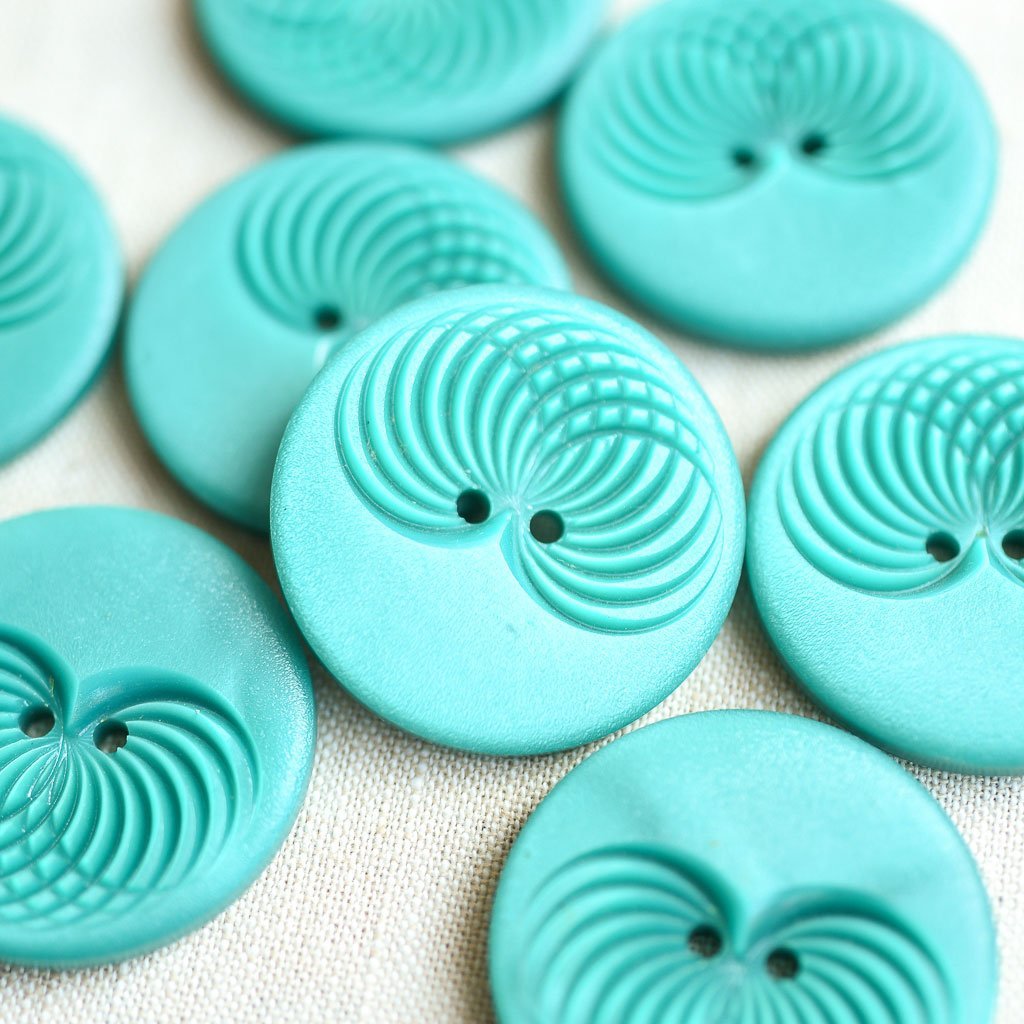 The Button Dept. : Plastic : Turquoise Slinky - the workroom