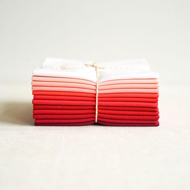 the workroom : Kona Solids Bundle : 365 Row 3 : Pearl Pink to Crimson : 12 fat quarters - the workroom